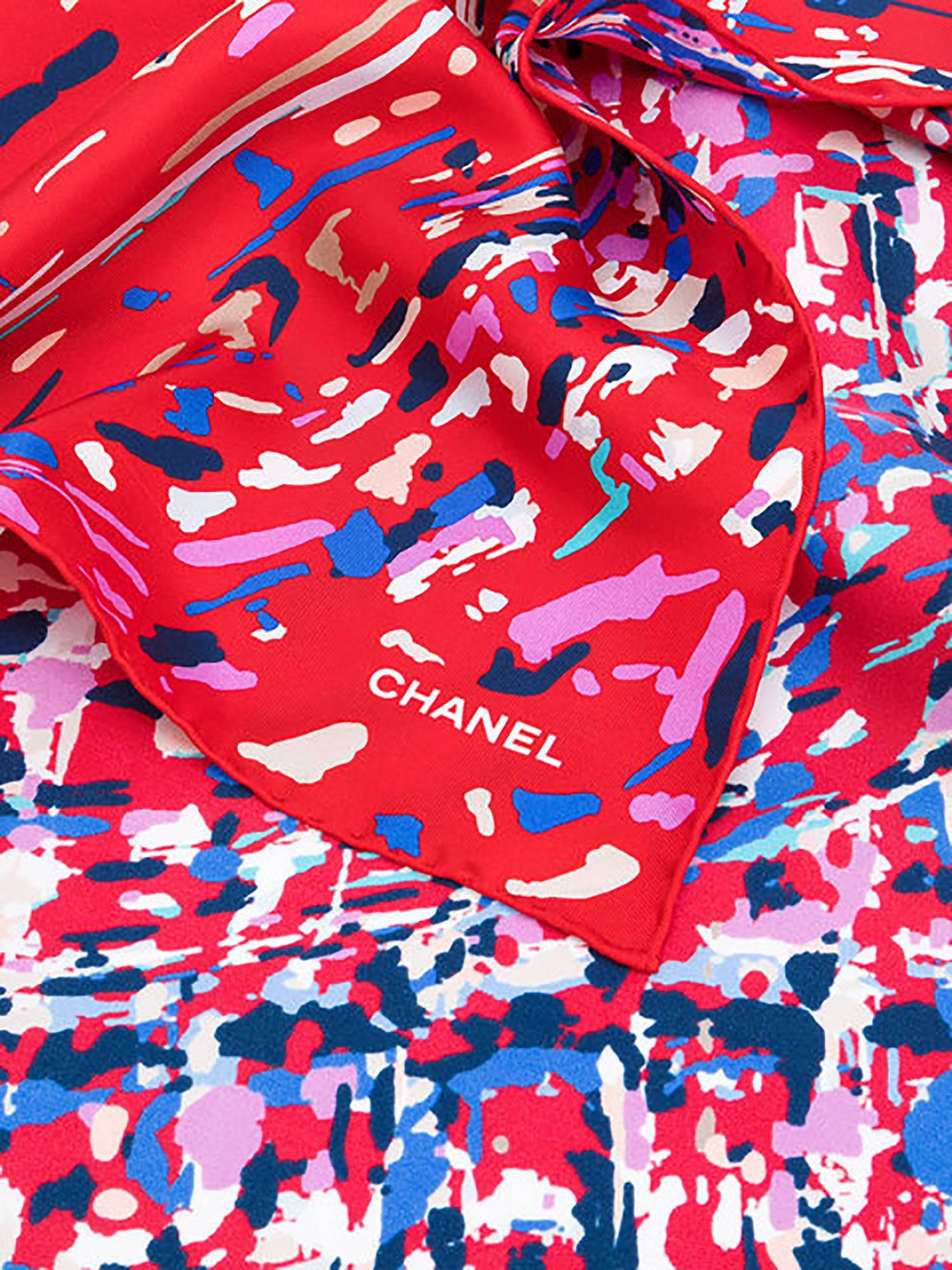 Red silk abstract print scarf from Chanel Vintage featuring a printed logo. Please note that vintage items are not new and therefore might have minor imperfections.

Made in Italy