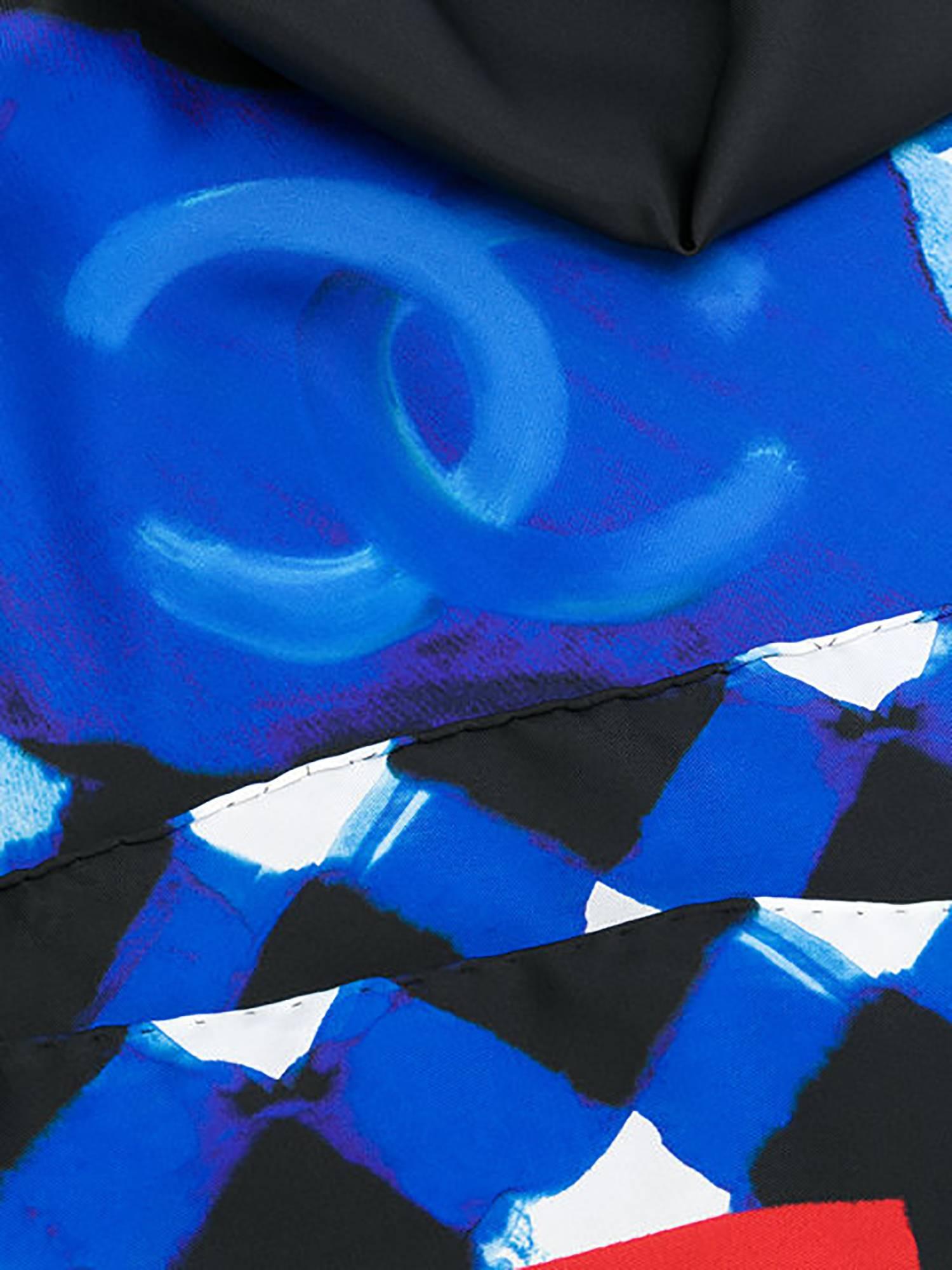 Electric blue silk abstract print scarf from Chanel Vintage featuring a printed logo. Please note that vintage items are not new and therefore might have minor imperfections.

Made in Italy