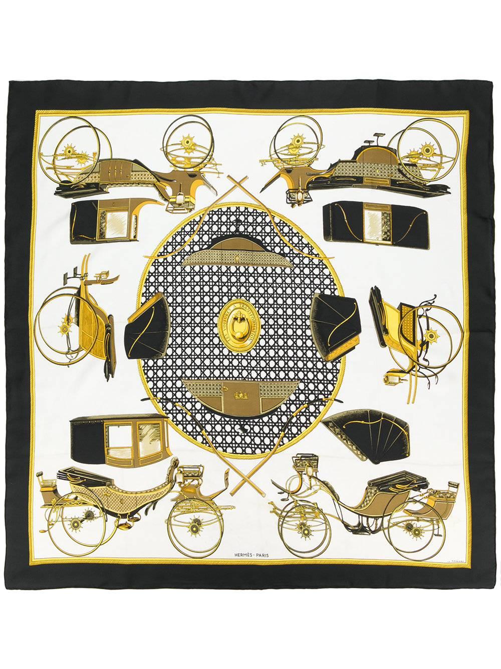 This black silk 'Les Voitures A Transformation' scarf from Hermès Vintage features a printed carriage design and a black border. 

Colour: Black/ White/ Gold

Material: 100% Silk

Measurements: 90 cm x 88 cm

Condition: 9/10