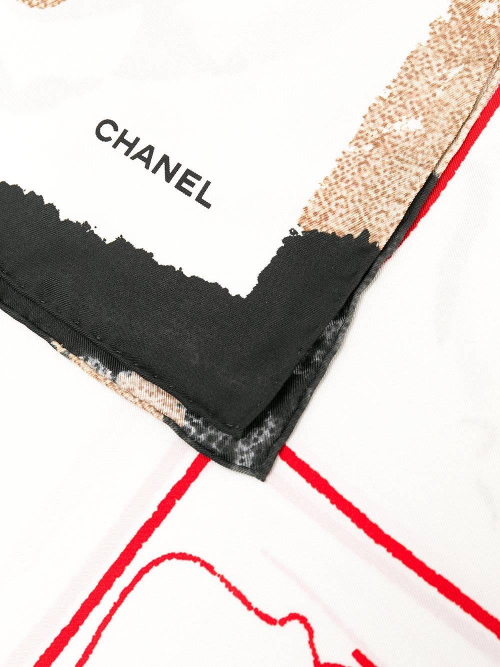 In a Parisian colour palette, this vintage Chanel scarf is spun from silk and a pattern of logos and camellias across its profile.

Colour: Cream/ Red/ Black/ Brown

Composition: 100% Silk

Size: 90cm x 87cm

Condition: 10/10