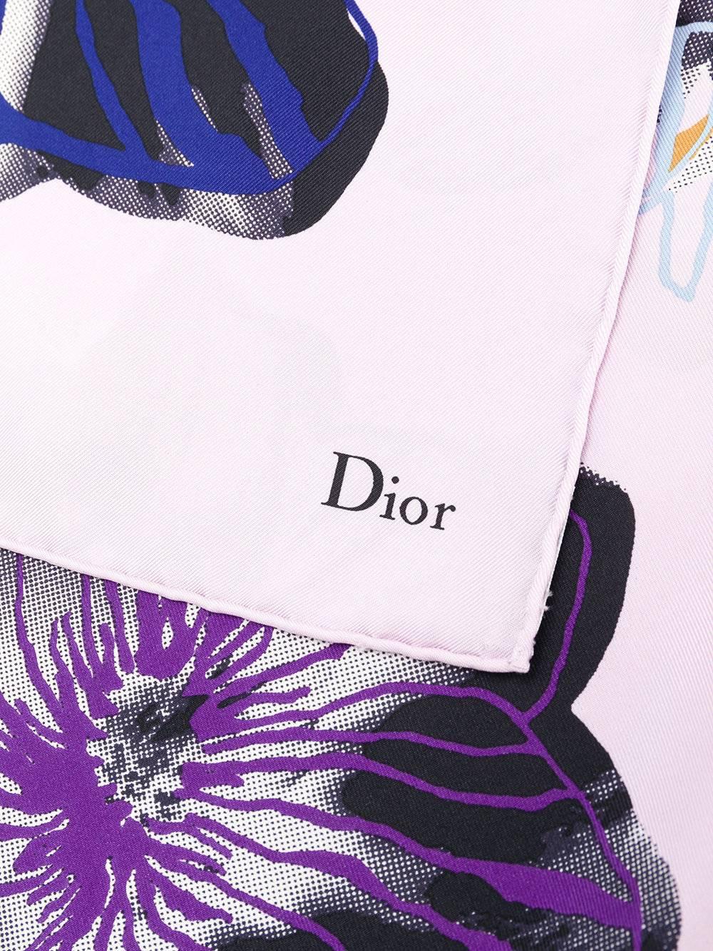 Crafted from a soft pure silk in lavender tone, this Dior scarf presents a romantic mixture of floral prints and modern sketches. With finished edges, Dior's logo is subtly printed on the rim. It also features an elongated length, allowing you to