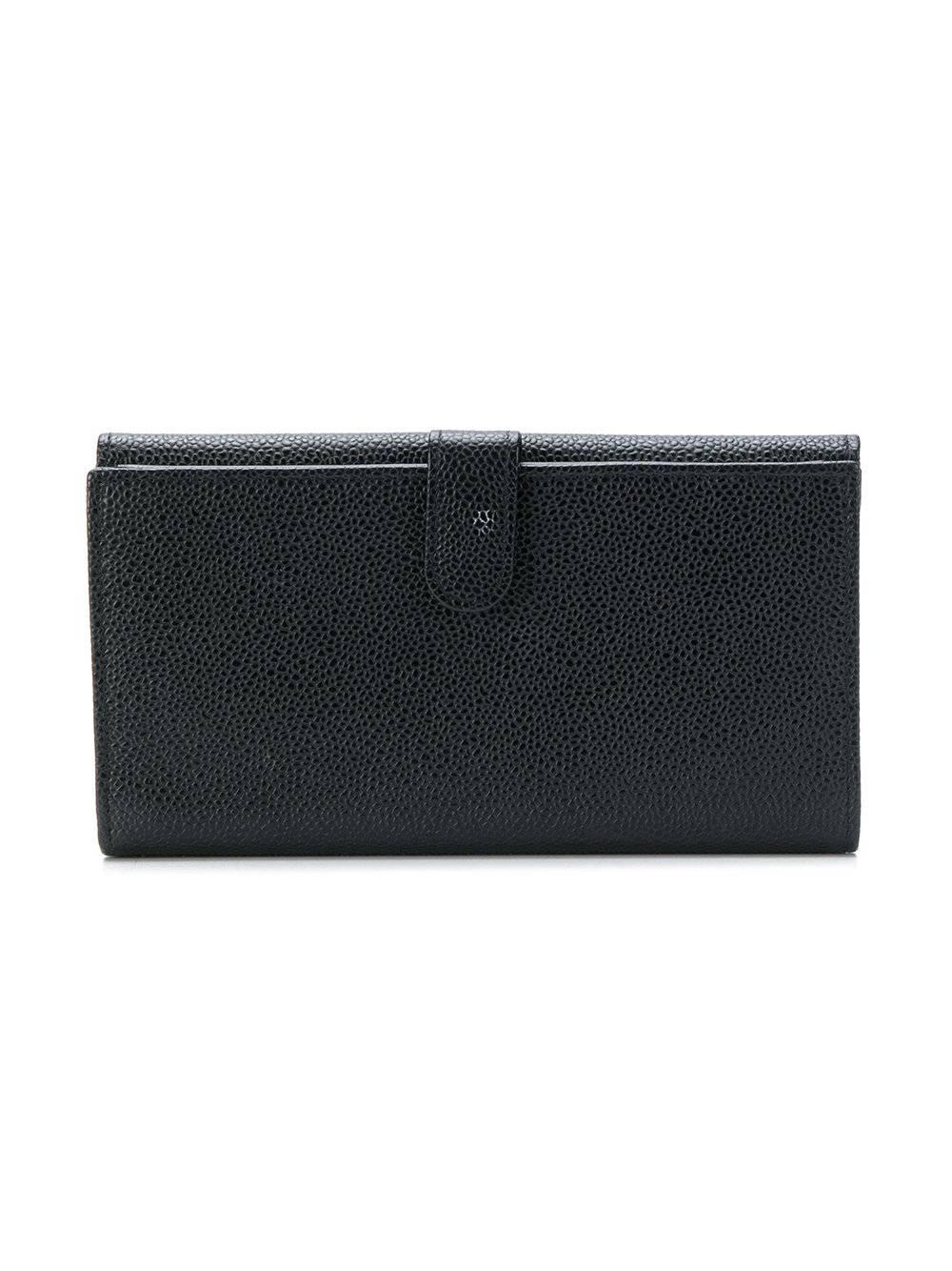 This Chanel wallet is the kind you'll use for years to come, and not just for its timeless silhouette. Expertly crafted in Italy from caviar leather, its bubbled grain is highly scratch resistant for a flawless finish year after year. Its quilted