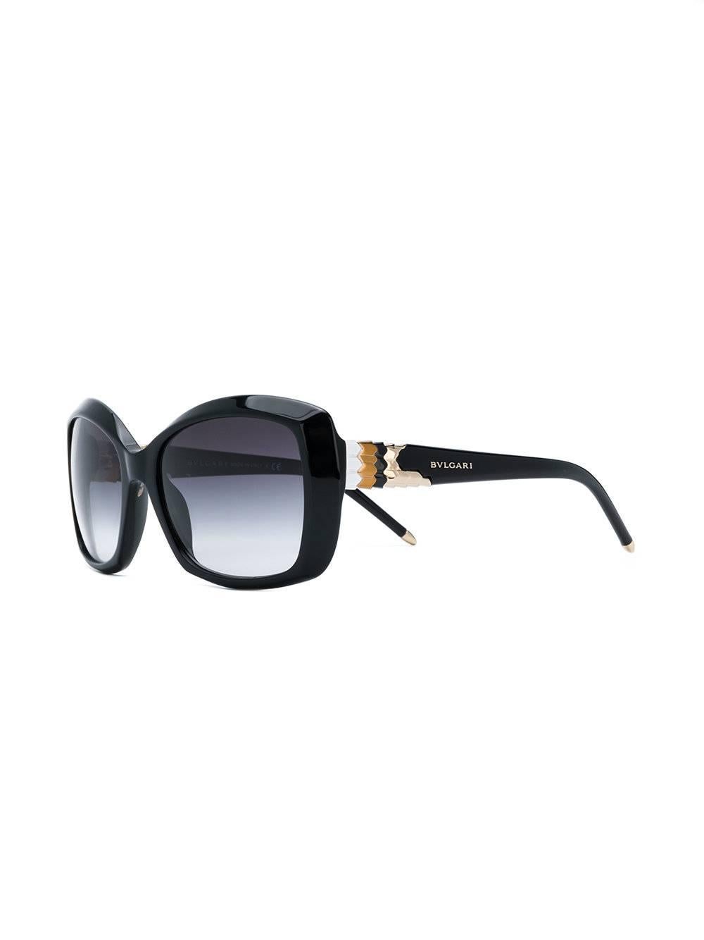 Add some edge to your look with these square-frame sunglasses by Bulgari, in black with metal embellishments. 

This item comes with a protective case.

Colour: Black

Material: Plastic

Measurements: Depth: 14cm, Circumference: 5.6cm, Bridge Width: