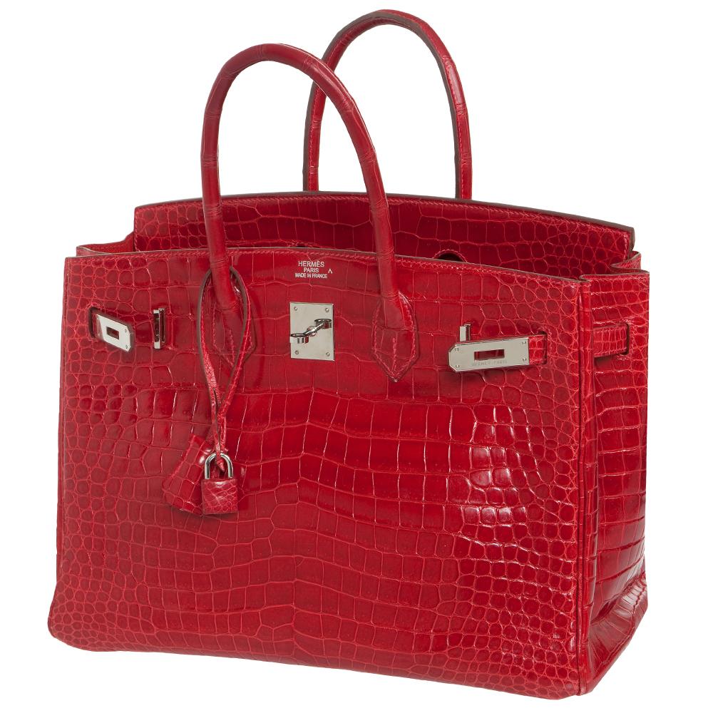 Invest in a classic with this Hermes Birkin, crafted in shiny crocodile Leather in a vibrant braise colour. Lined with a matching goatskin leather, this spaciously sized bag features two interior pockets: one open and one zipped and is accented with
