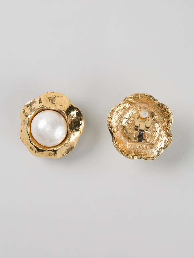 Gold-plated earrings from Chanel Vintage featuring a pearl at the centre.