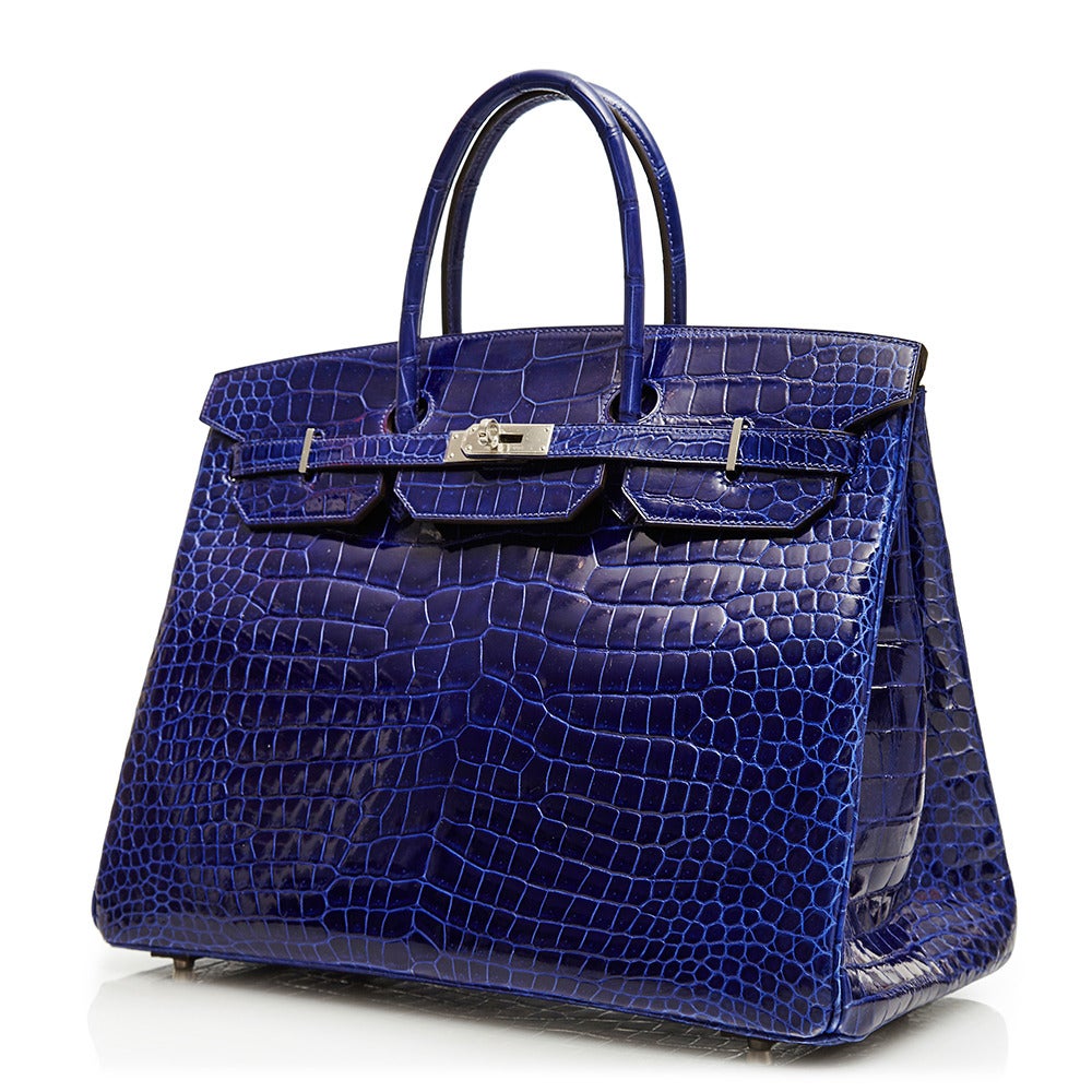 A rarity amongst its counterparts, this Birkin from Hermès is an incredible one-of-a-kind piece. Expertly crafted in crocodile leather, the 40 cm bag features a stand-out Electric Blue colour that is complimented by its silver-tone hardware.