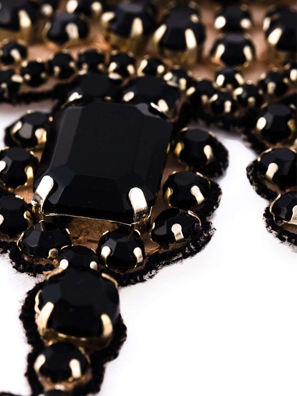 This black cotton and plastic embellished necklace from Valentino features a lobster clasp closure, a silver-tone logo plaque, a rolo chain and rhinestone embellishments.

Colour: Black

Material: Cotton, Plastic

Measurements: width: 10