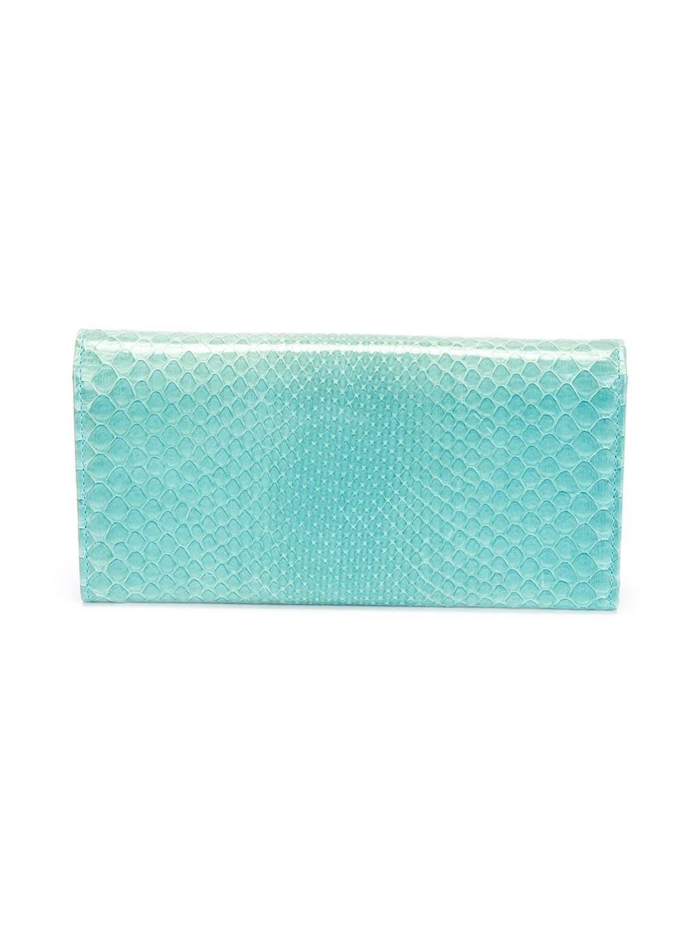 This mint green python skin continental wallet from Christian Dior features a foldover top with snap closure, a zipped coin pouch, multiple interior card slots and an embossed internal logo stamp.

Colour: Mint Green

Material: