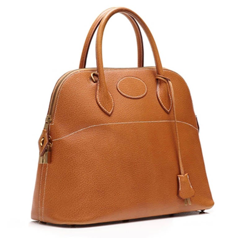 Hermès Vintage Bolide Tan Leather Bag. Bolide handbag from Hermès, a sought after model which was first created by Hermes in 1922 and was the first bag ever to incorporate a zipper. Crafted in tan Epsom Leather and lined with a super- supple leather