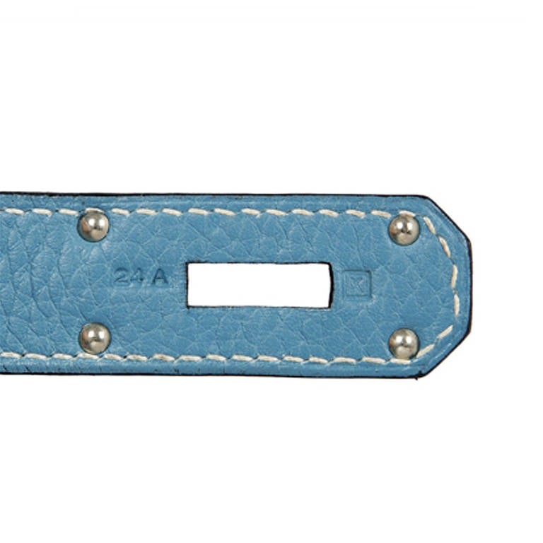 Hermès Shoulder Birkin bag in Blue Jean Togo leather. The bag's hardware is palladium and it has two interior pockets one of which is zipped. This bag has its original dust-bag, lock and key.

Colour: Blue Jean

Material: Togo leather,