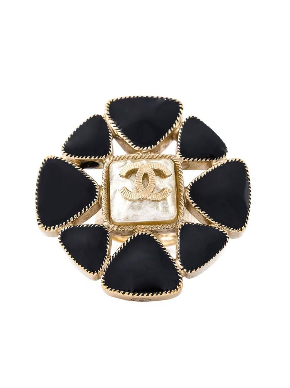 Gold-tone and black metal ring.

Colour: Gold-tone, Black

Material: Metal (Other) 85% Glass 15%

Measurements: Circumference: 53mm

Condition: 10 out of 10
Excellent, Next-to-new