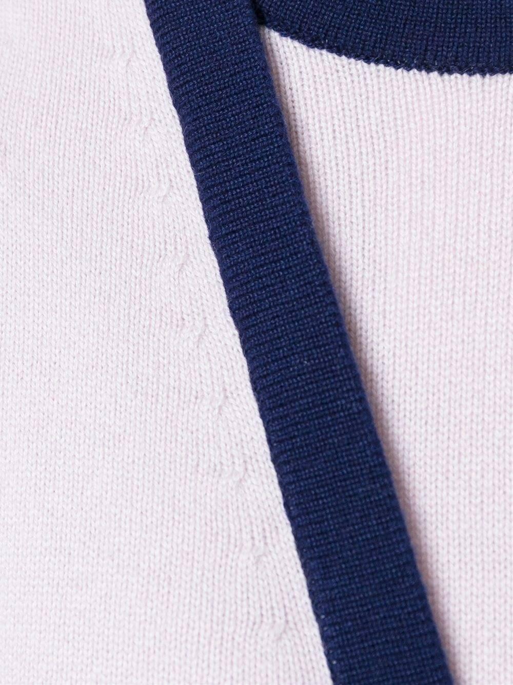 Pink cashmere sleeveless cardigan dress. 

Colour: Pink / Blue

Materials: Cashmere 100%

Size: FR 40

Measurements: bust: 94 centimetres, shoulder: 35 centimetres

Condition: 9.5 out of 10