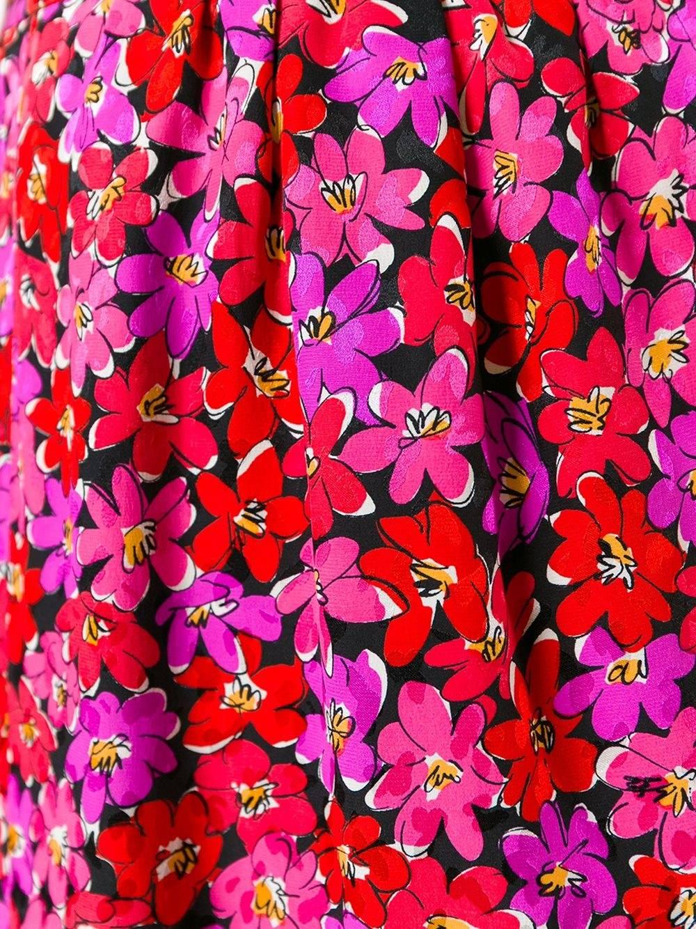 Yves Saint Laurent Vintage multicoloured silk floral print pencil skirt.

Colour: Black / Red / Purple / Pink

Material: Silk 100%

Size: FR 38

Measurements: length: 59 centimetres, hips: 90 centimetres, waist: 66 centimetres

Condition: