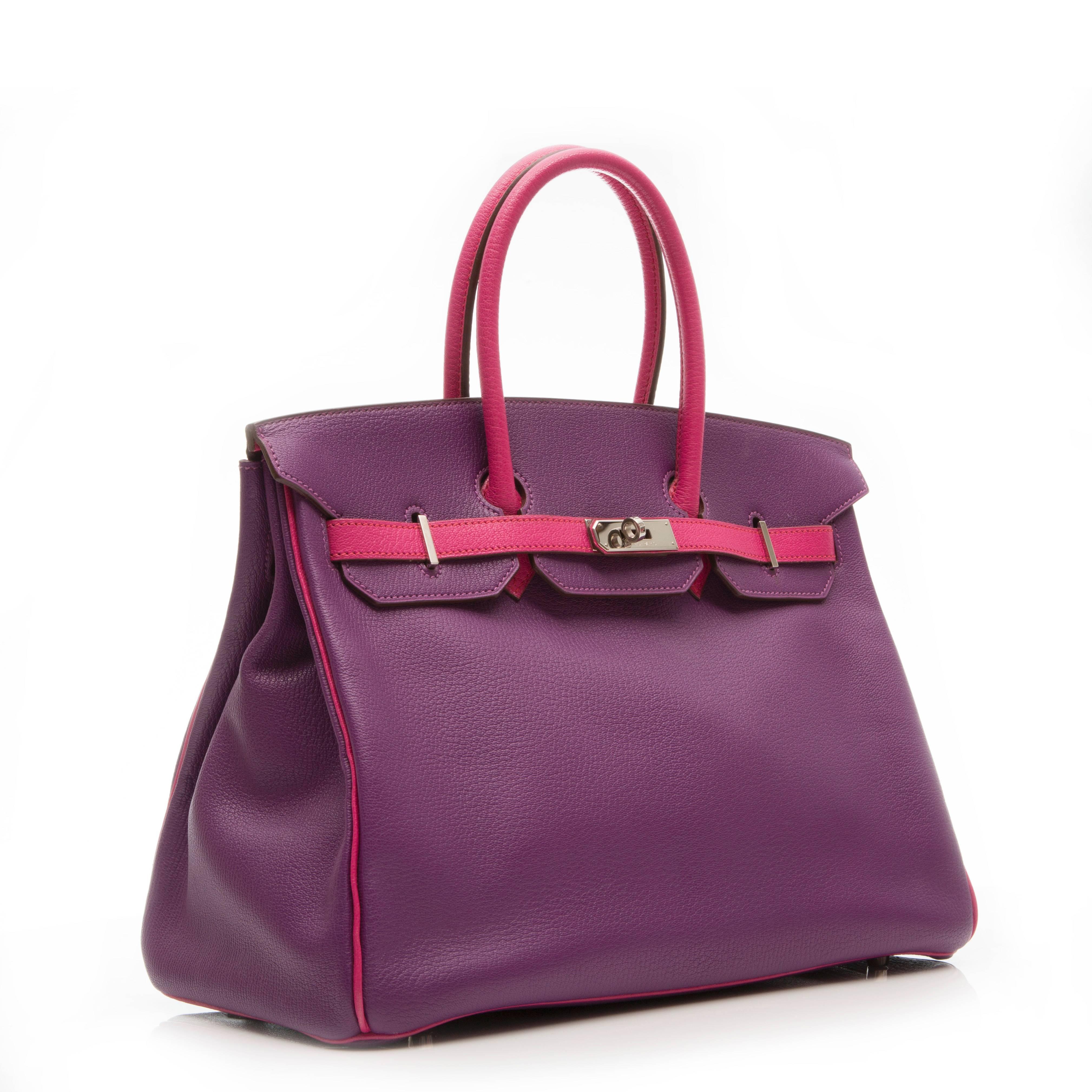 A dazzlingly feminine rendition of the Hermès Birkin handbag. A special order bi-tone of ultra-violet and rose tyrien pink Togo leather are offset with cool, palladium hardware. Togo leather is an incredibly popular Hermès leather for its