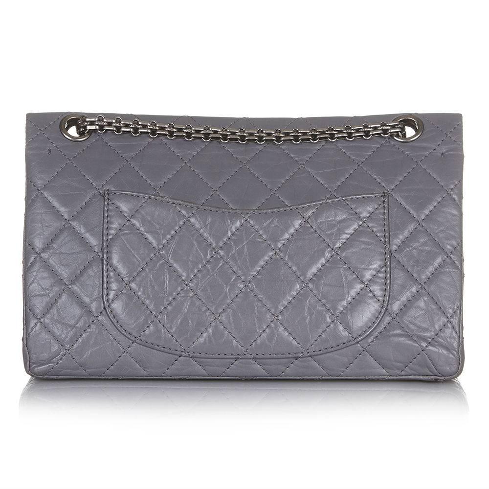 This edition of the iconic Chanel Reissue 2.55 is crafted from a slate grey aged calfskin and finished with gunmetal hardware. Chanel’s aged leather is a highly popular finish, given its durability and vintage effect. 

Colour: Slate