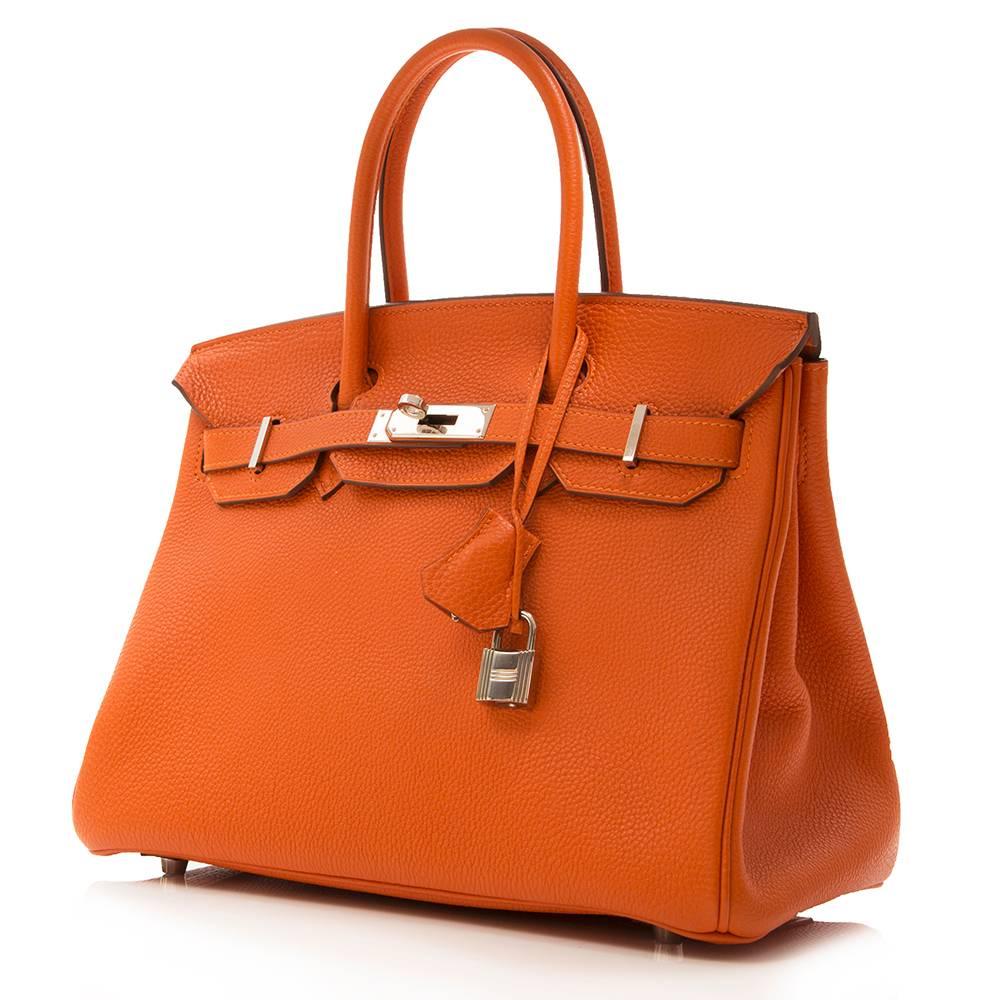 A handbag doesn’t get more iconic than an Hermès Birkin in the maison’s signature shade of Orange. This edition of the highly-sought design is crafted from Togo leather, a popular Hermès hide for its scratch resistance.

This item arrives with