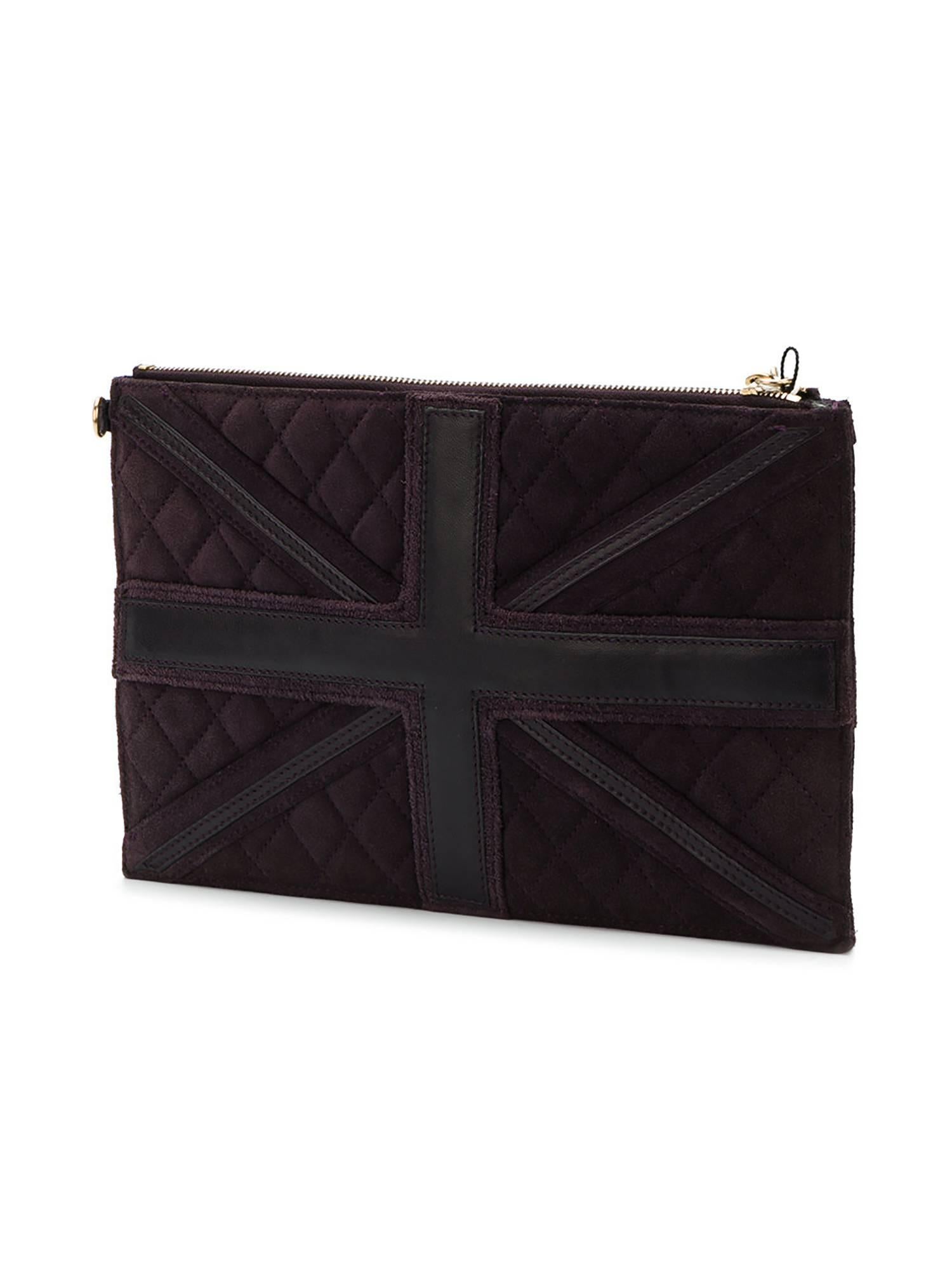 The Chanel Purple Suede Union Jack Zippered Wristlet is the perfect wear over your shoulder or as a wristlet. It is featured in purple suede with tonal leather piping details. In gold tones, the label's iconic monogram adorns the front, alongside a