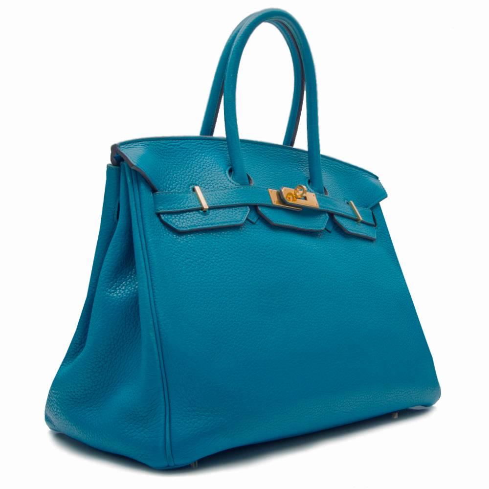 Make a bold statement with this enchantingly coloured Hermès Birkin tote bag. Its Clemence leather exterior is highly popular due to its ability to retain its shape and scratch resistance. This is offset by gold plated hardware. 35cm in width, the