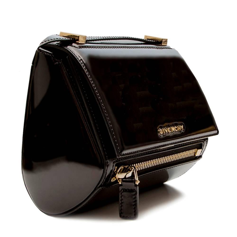 The Givenchy Pandora Box mini black patent leather shoulder bag is a sophisticated yet edgy take on the classic structured shoulder. This is a basic essential to add to your collection that will easily take you from day to night. The cute mini size