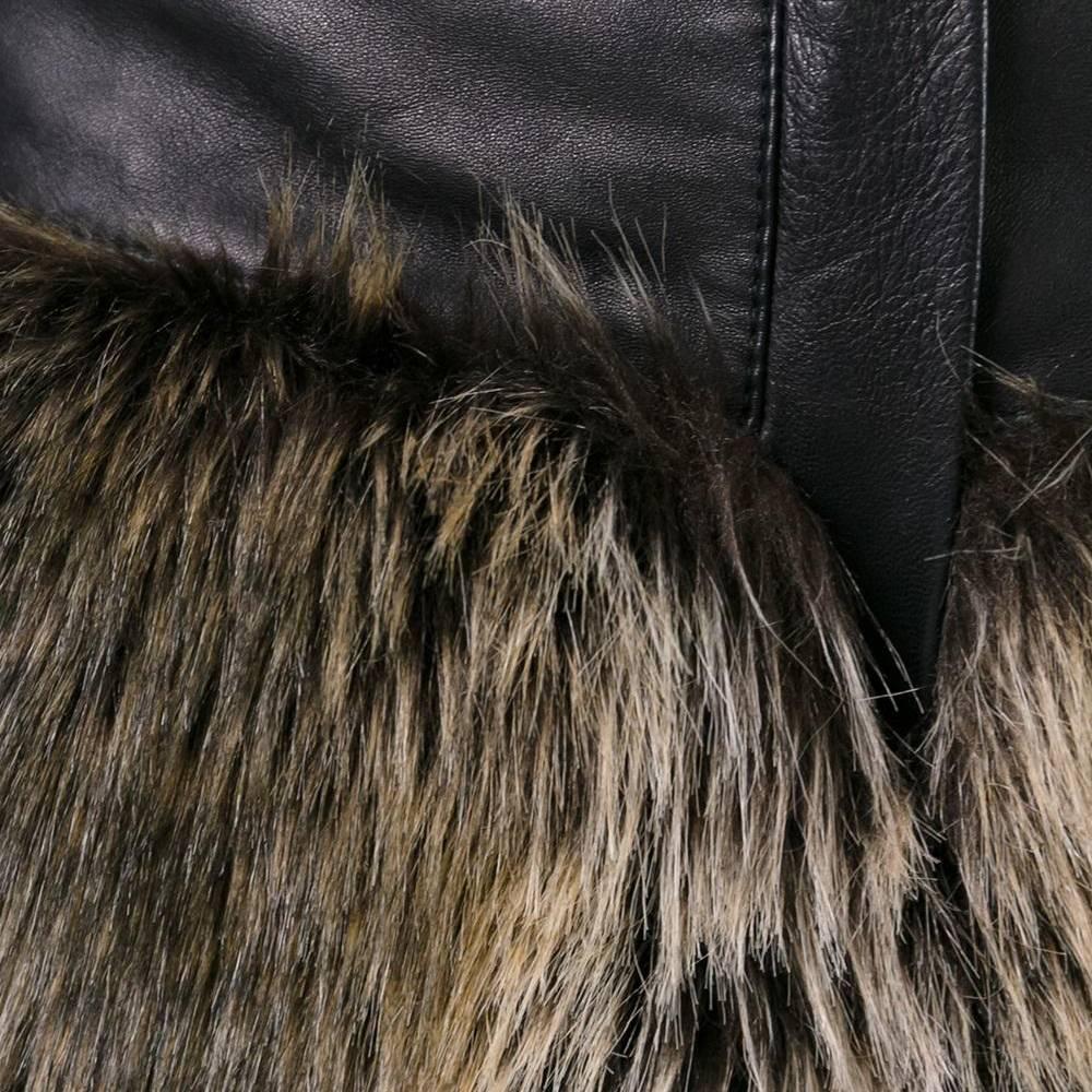 Rock a pair of furry hot pants straight from the Arctic fantasy of Chanel's autumn/winter 2010 catwalk. Crafted from animal-friendly, brown-toned faux fur, lined in silk and flatteringly cut to the figure in black lambskin leather along the waist.