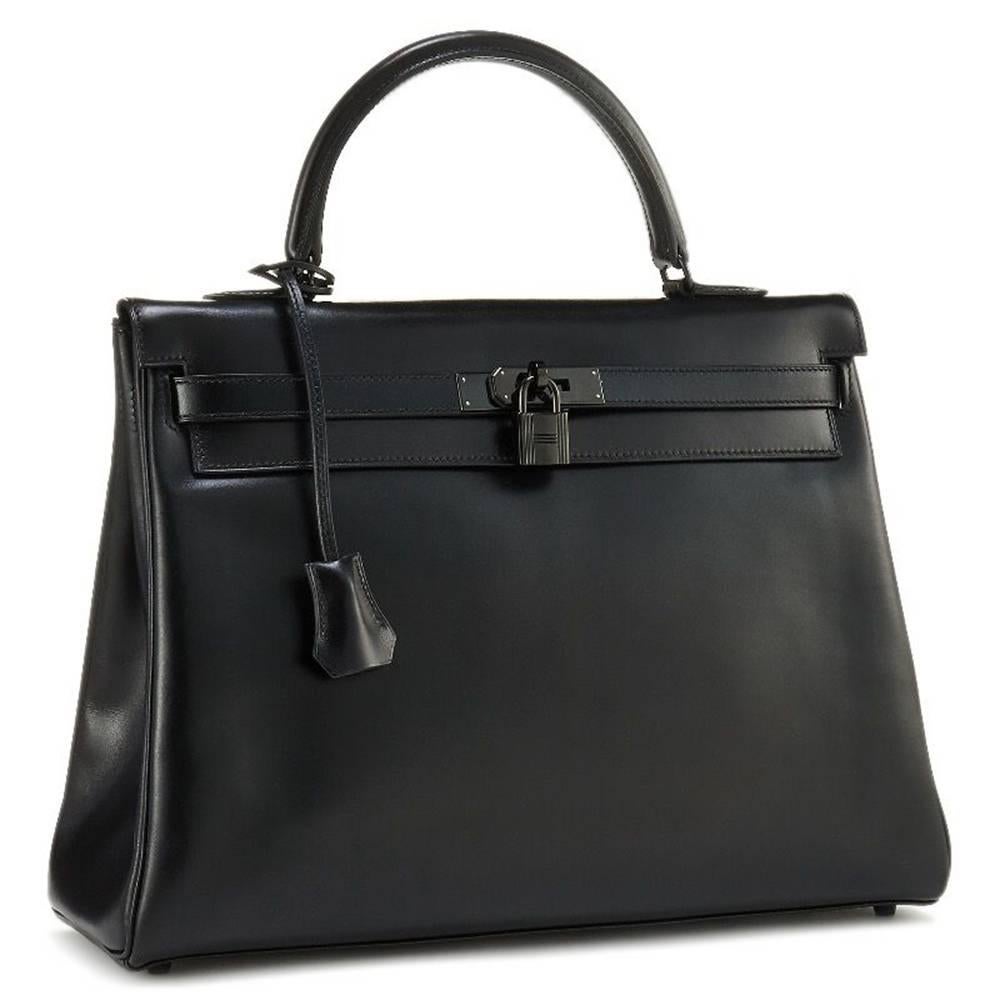 This vintage So Black Kelly bag from Hermès is a true testament to the quality of the house's craftsmanship, exuding timeless style and elegance, perfect for any occasion with black box calf leather and beautiful black-tone hardware. The intricate