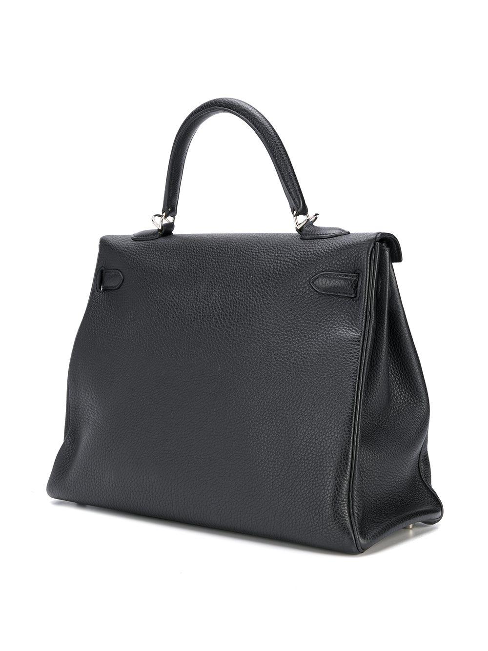 Treat yourself to this classic black pebbled Hermès Kelly bag, a true testament to the quality of the house's craftsmanship, exuding timeless style and elegance, perfect for any occasion. Rendered in a smooth and lightweight Togo leather, popular