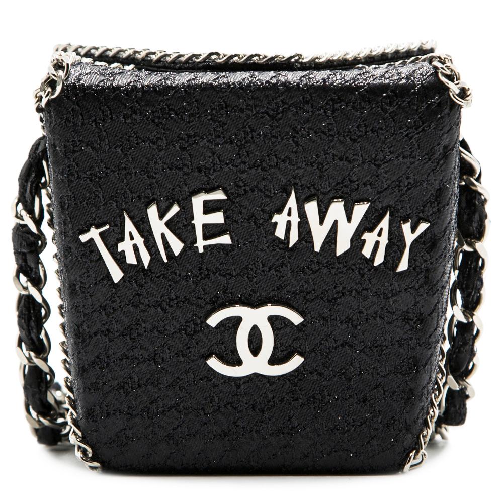 This Limited Edition and extremely sought after Take Away Box bag from the Chanel Shanghai Accessories Runway Collection is crafted from a combination of black lambskin leather and metallic fabric. Both exuberant and whimsical, the piece features