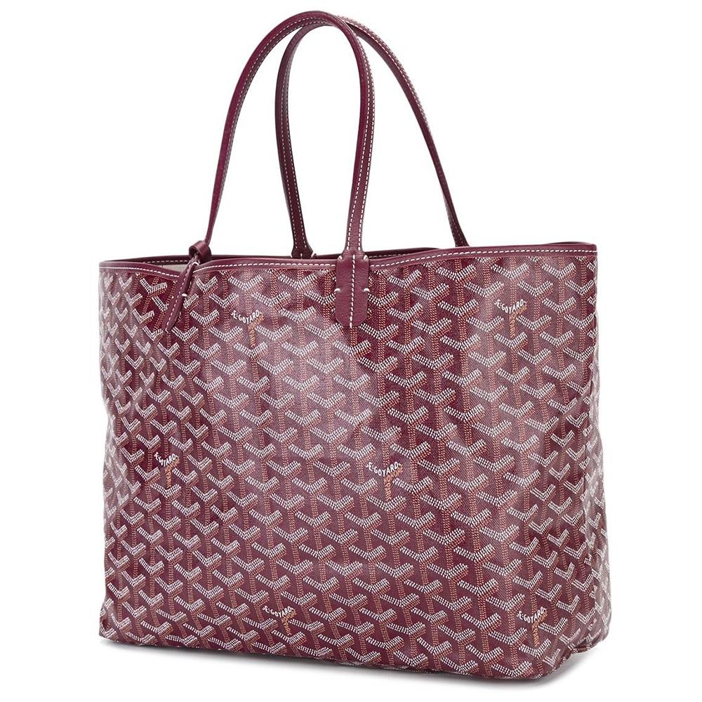 A handbag to truly set your heart aflutter, this burgundy Monogram St Louis tote Bag was crafted from Goyardine Canvas, a coloured textile made from cotton, linen and hemp, and vitalised by a flurry of custom hand-painted butterflies (not original
