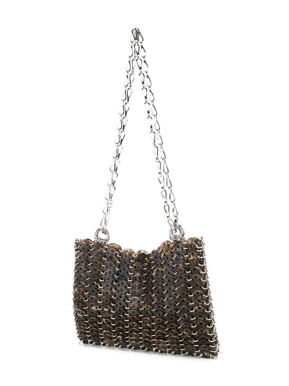 In Paco Rabanne's iconic chainmail finish, this shoulder bag is a textural play of plastic discs threaded with metal rivets. The discs are finished in a marbled brown for a tortoise-shell effect. Its silk-lined interior is finished with a Paco