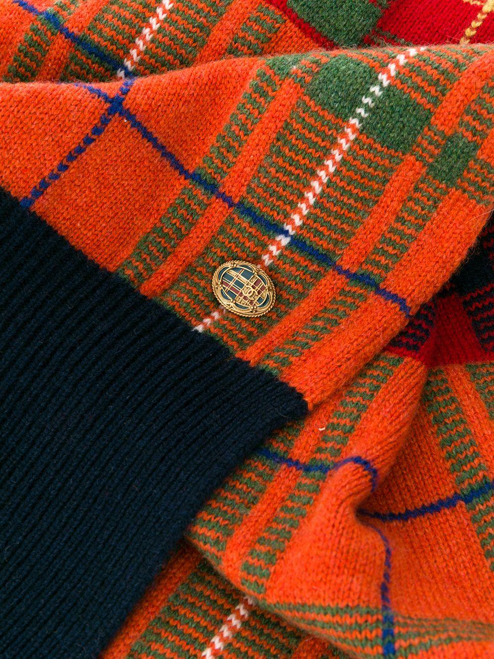 Both casual and practical, this delicate pure cashmere knit scarf, crafted from red, orange, yellow and green, is a wonderful addition to your wardrobe, featuring ribbed detailing around the hem and a tartan pattern.

Colour: Red/