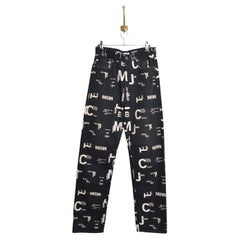 Vintage Franco Moschino 2000s Schwarz aus Schlüssel drucken Spell out denim Jeans