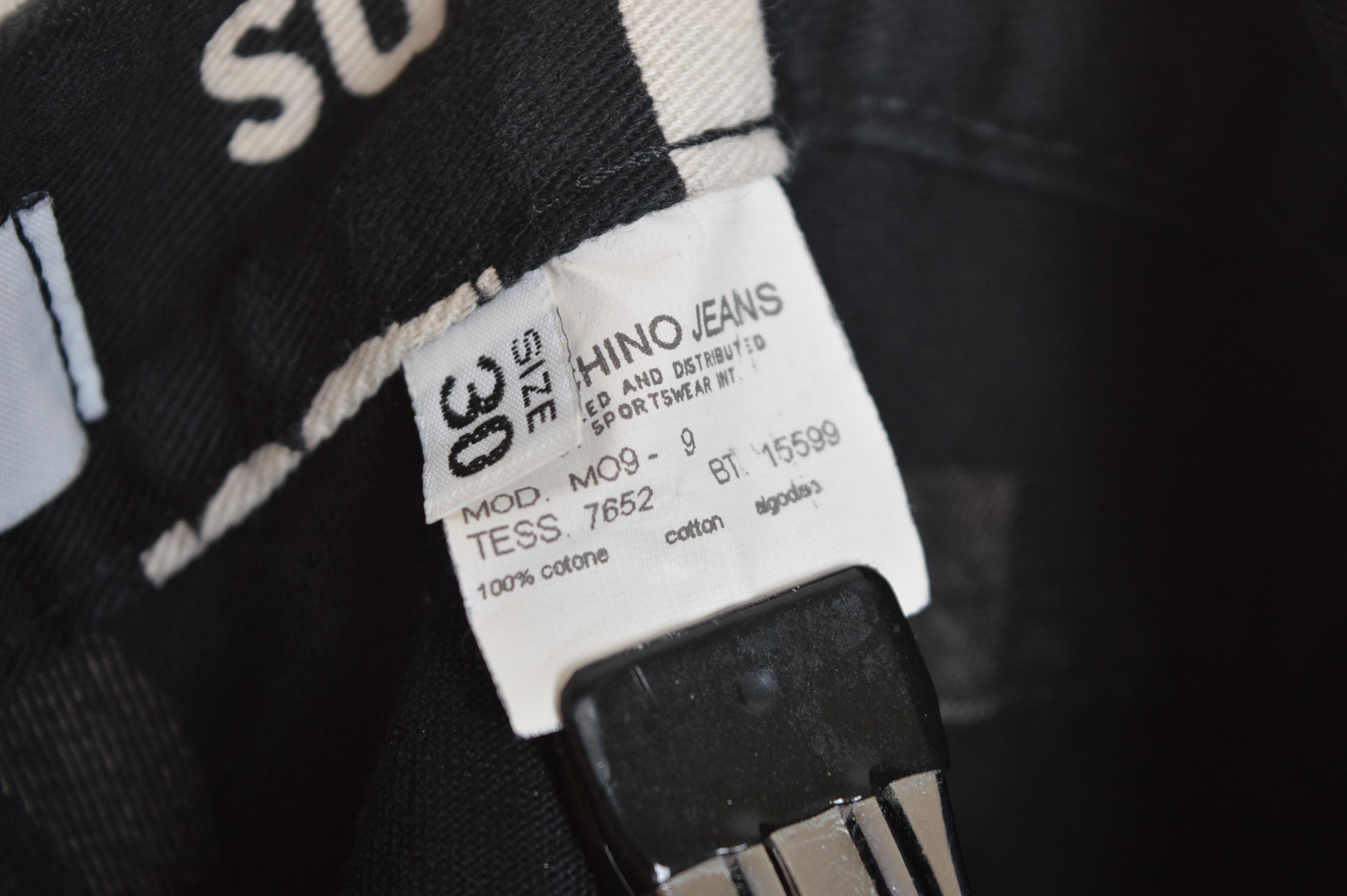 Vintage Franco Moschino 2000s Negro con estampado Spell out vaqueros en venta 10