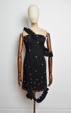 Moschino Cheap & Chic Avant Garde – Schwarzes Multifunktionskleid mit Nietenverzierung aus den 2000er Jahren