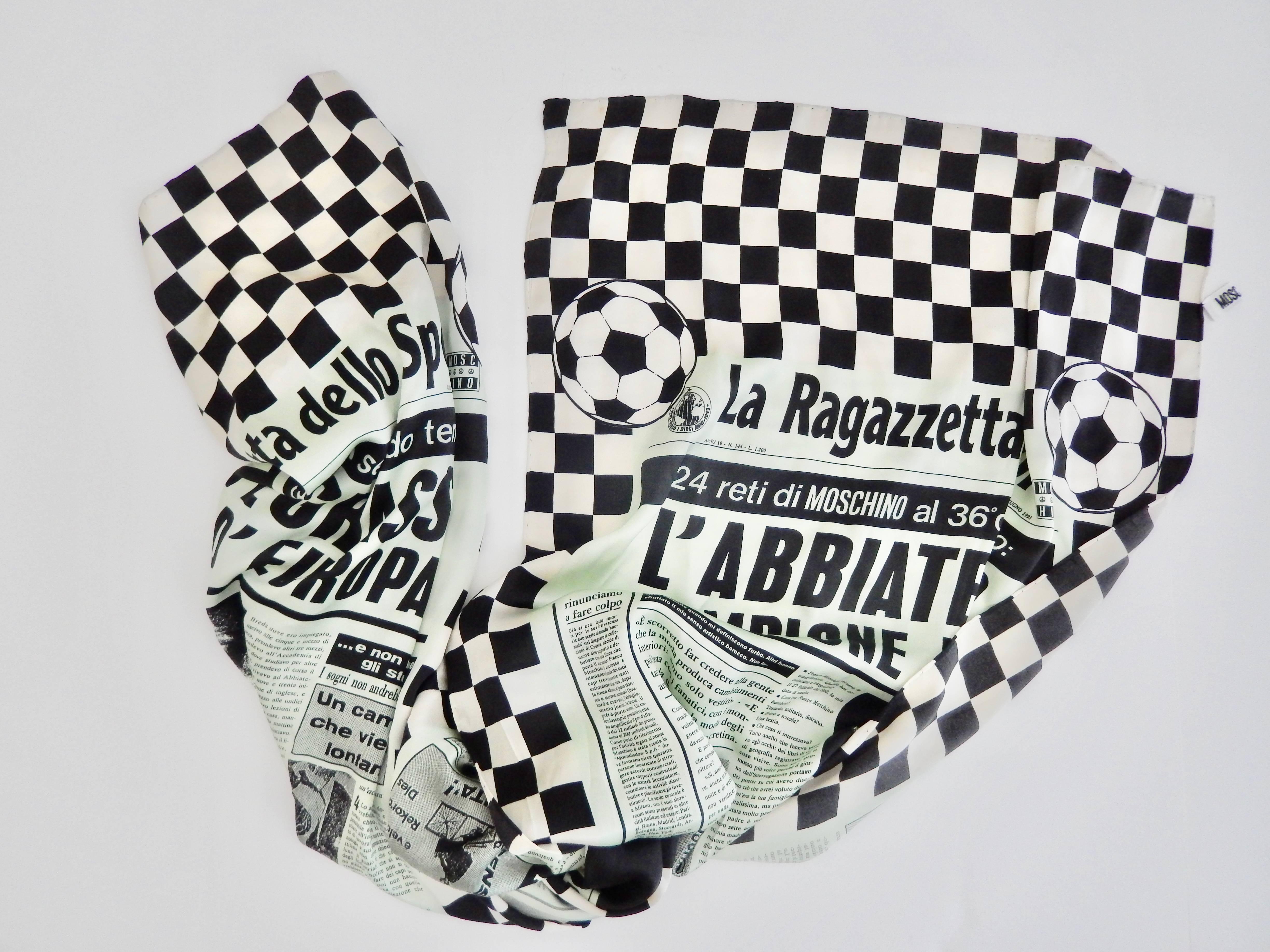 A modernist, vintage silk scarf from the 1990s by the innovative designer Franco Moschino (1950-94).  The irreverent, whimsical design satirizes a sports newspaper and exemplifies Moschino's reputation as an unconventional, avant-garde designer.  A