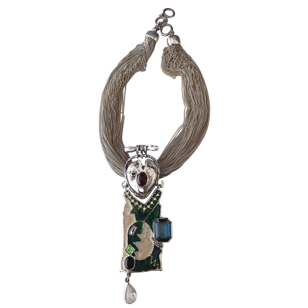 A rare multi-strand necklace by Christian Lacroix that combines tribal and abstract imagery in an opulent design. As he did in his couture fashion, Lacroix was inspired by historical and multi-cultural references, mixing patterns and materials