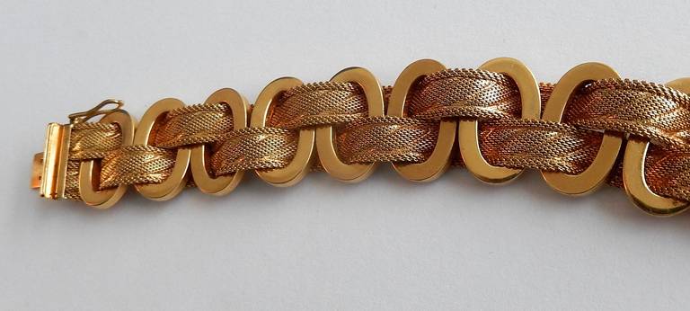 A beautifully constructed gilt mesh bracelet by Christian Dior. It is marked on clasp 