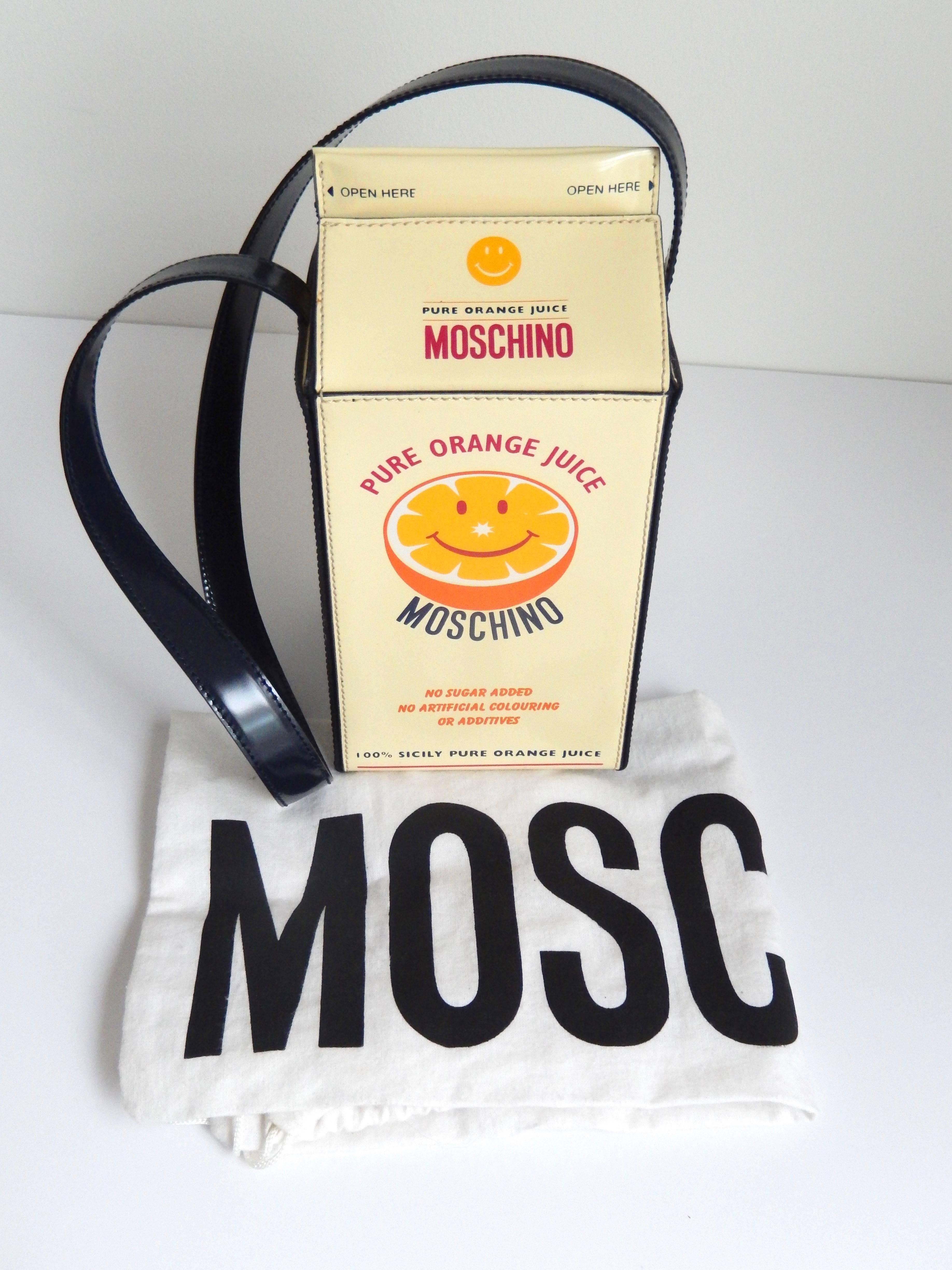 A highly collectible, vintage handbag by Moschino in the shape of an orange juice carton, 