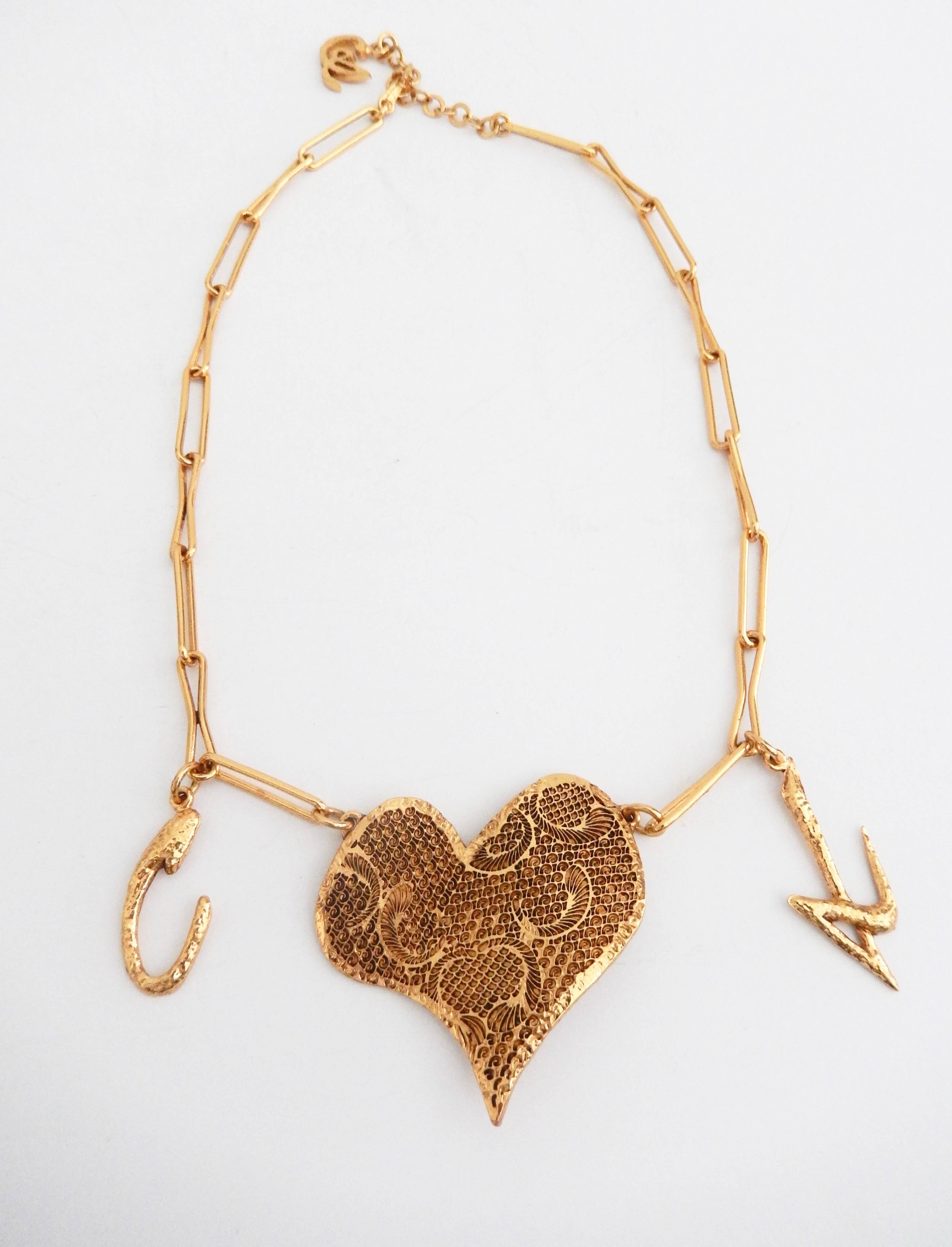 Christian Lacroix Gilt Heart Pendant Necklace with Signature Charms, 1990s  In Excellent Condition For Sale In Winnetka, IL