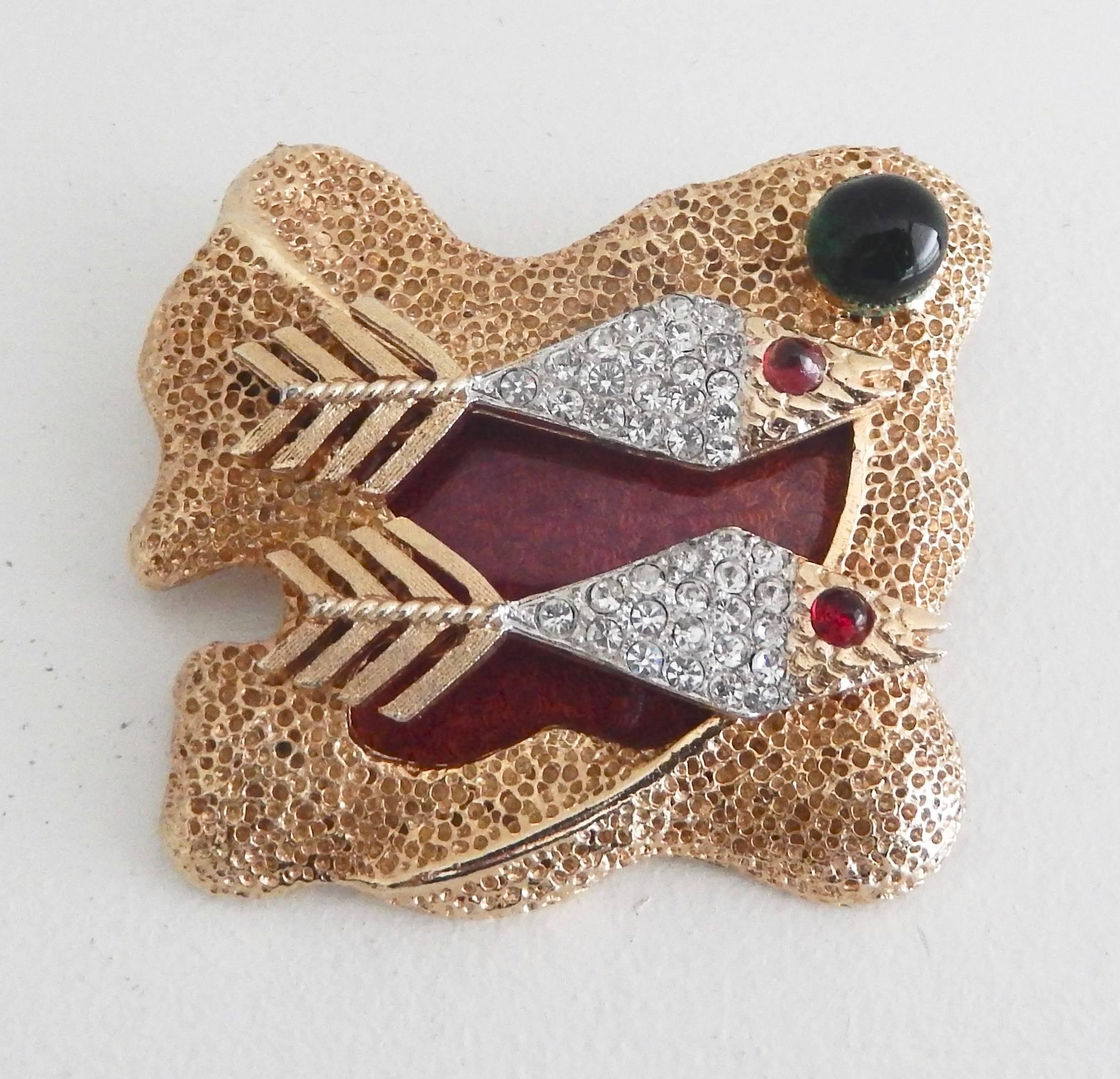 A rare, sculptural pin by Vendome of two rhinestone pave fish.  Designed by Helen Marion, head designer of Coro's high end line, Vendome, it is one of six designs inspired by the work of Georges Braque.  Marion was known for using high quality
