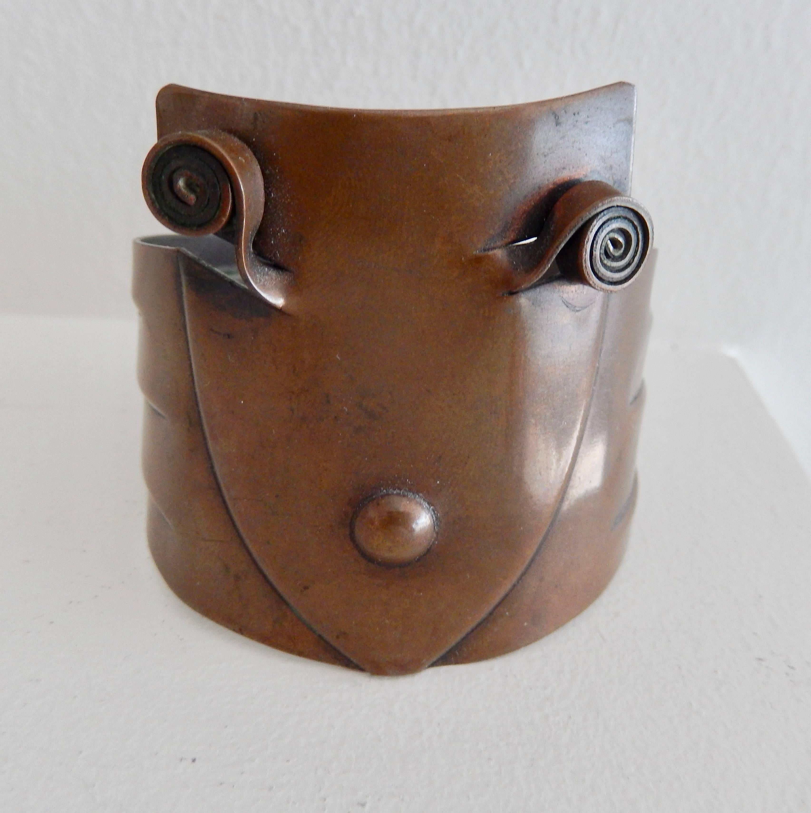 A unique, handwrought copper cuff by the master metalsmith Francisco Rebajes (1907-1990).  A striking example of postwar American craft--a collector's piece. Signed.

Rebajes, born in the Dominican Republic, went to New York in the 1920s and in 1940