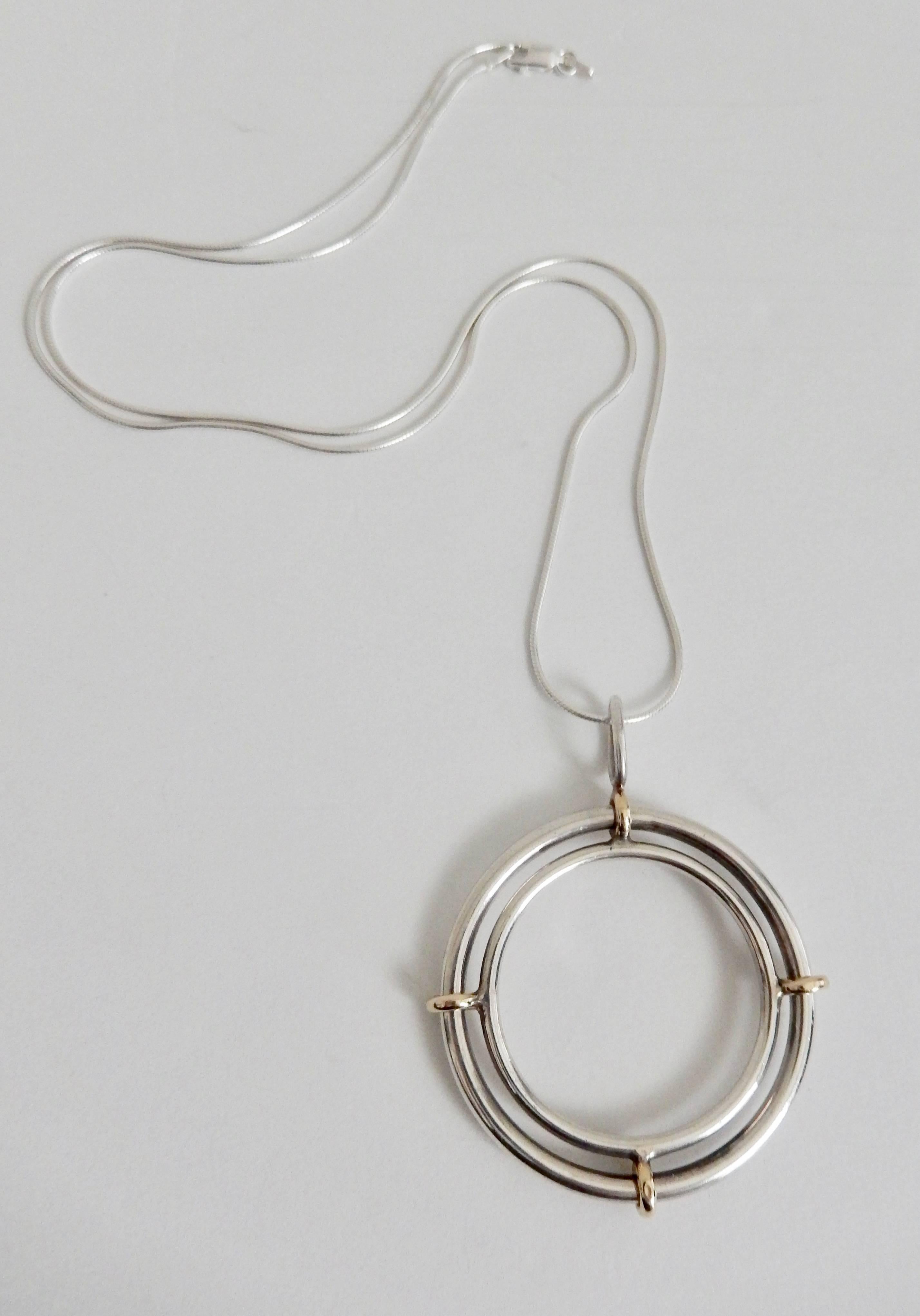Pierre Cardin Sterling Silver and Gold Kinetic Pendant, 1970s  In Good Condition For Sale In Winnetka, IL