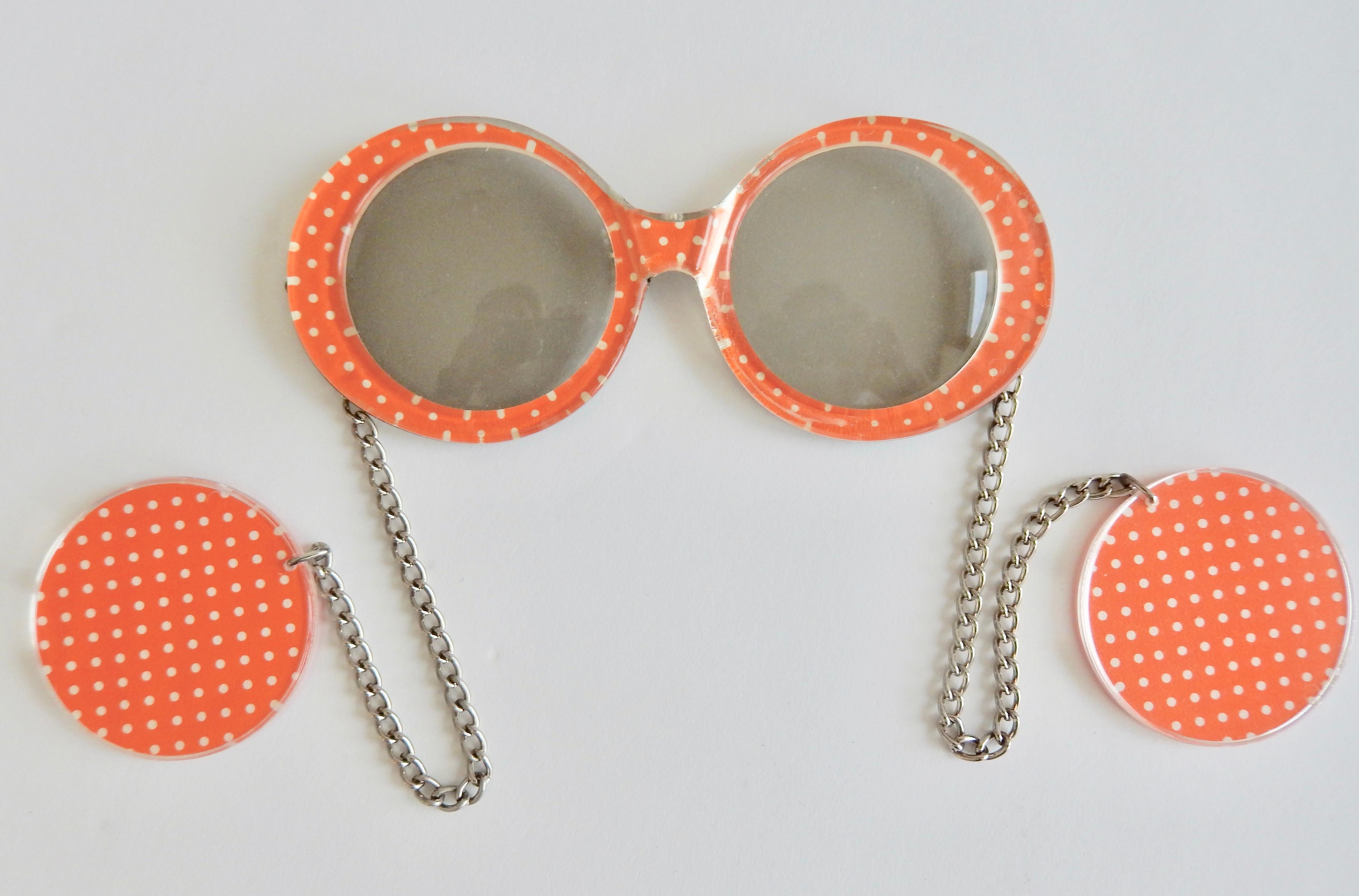 sunglasses with earrings attached