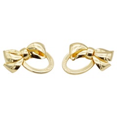 Christian Dior 1980s Massive Glow Bow Oval Ribbon Logo Monogram Clip Earrings