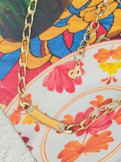 Collana Christian Dior vintage in oro con cristalli gialli ricurvi e motivo Omega intrecciato