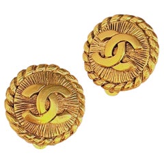 Chanel Vintage Unisex Gold Iconic Sunburst Spiral Coco Circle Round Earrings