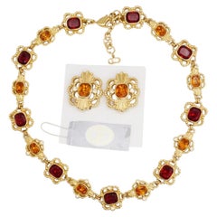 Christian Dior Vintage: set traforato con rubini, topazi, citrini e cristalli di topazio ovali in oro