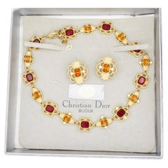 Parure Christian Dior Vintage en or, avec rubis, topazes, citrines et topazes ovales, en cristaux ajourés
