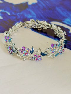 Pulsera entrelazada de Jewelcraft, de plata vintage, con el icono «Coro», hoja azul icónica y rojo aurora
