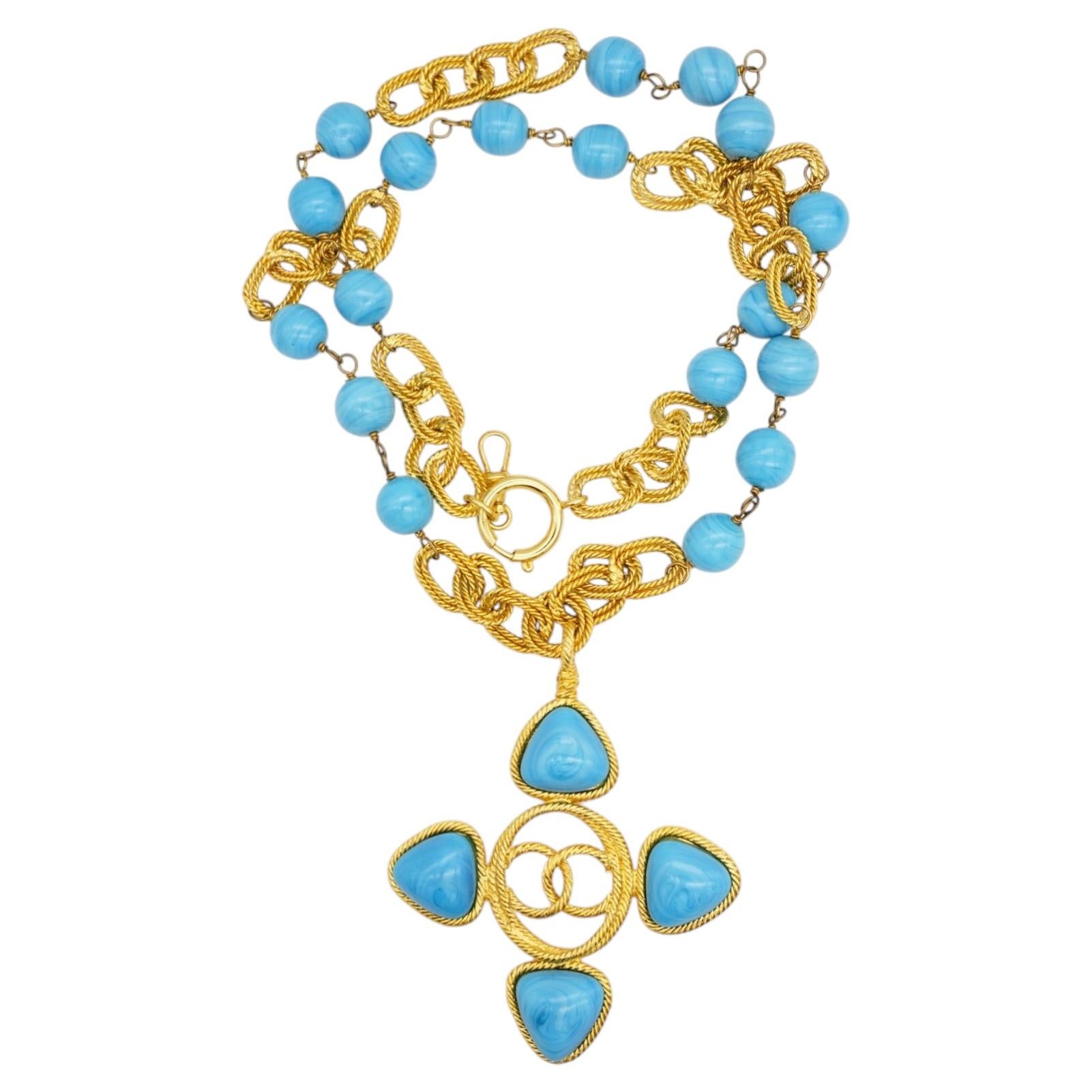 Long collier Chanel vintage 1991 Haute Couture, perles en forme de croix turquoise Gripoix