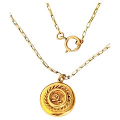 Chanel Vintage Textured Iconic Gold Circle Braided Coco Pendant Chain Necklace